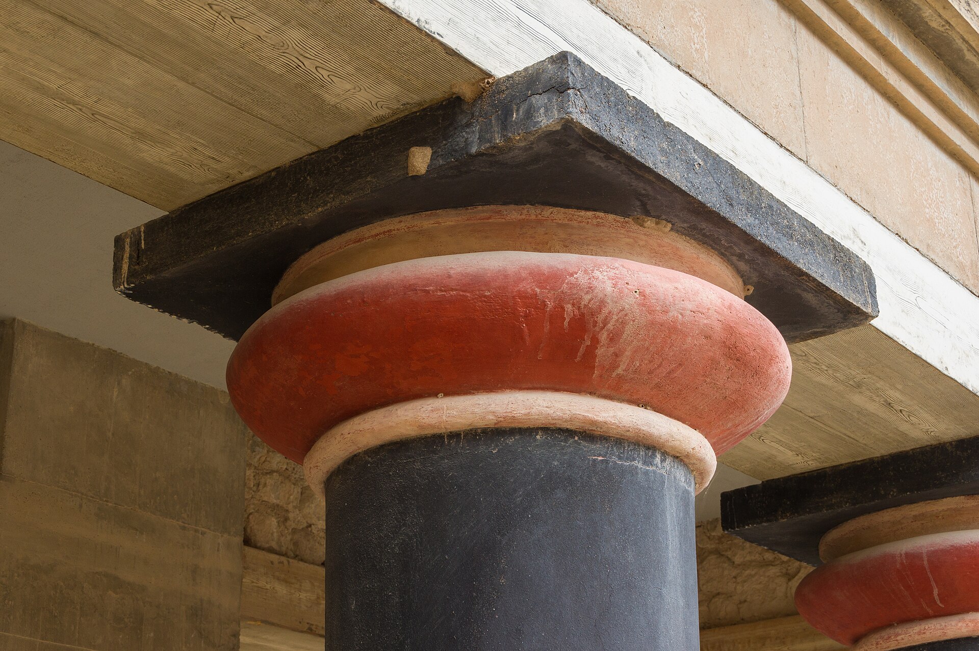 Reconstructed terracotta columns at the Minoan palace of Knossos