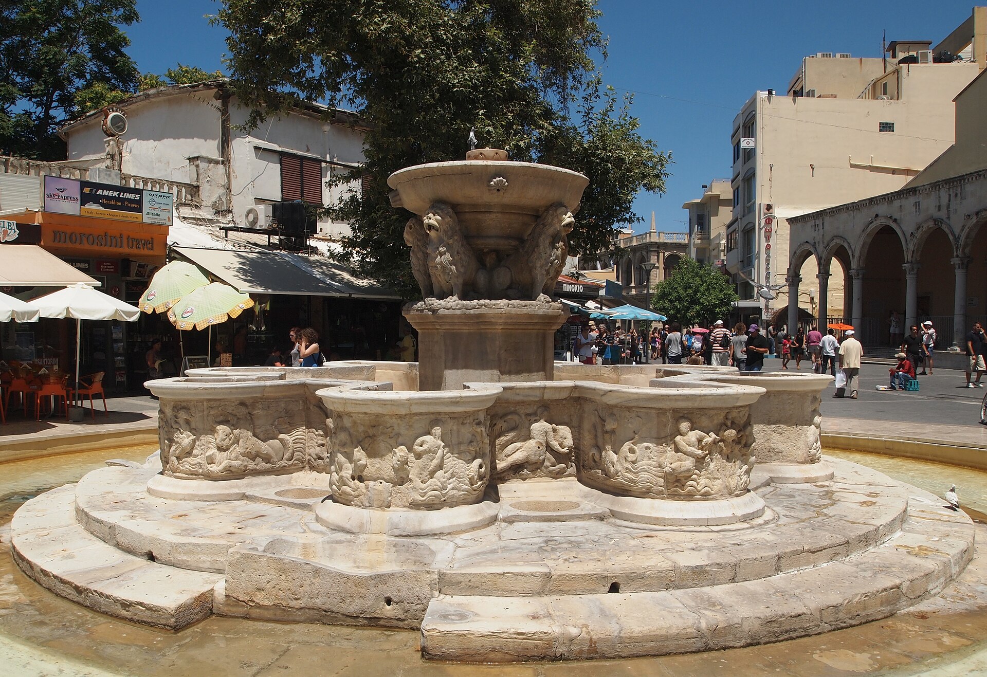 The Morosini Fountain in Heraklion's Venetian old town, ringed with cafes and tavernas